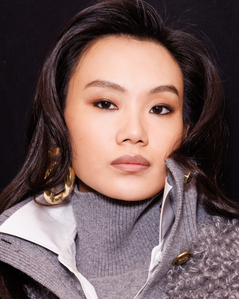 Closeup of Ming Xi with waterline makeup.