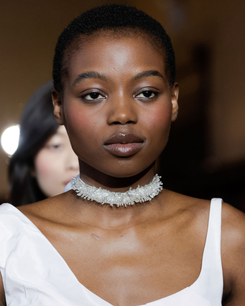 Closeup of a model with matte skin makeup.