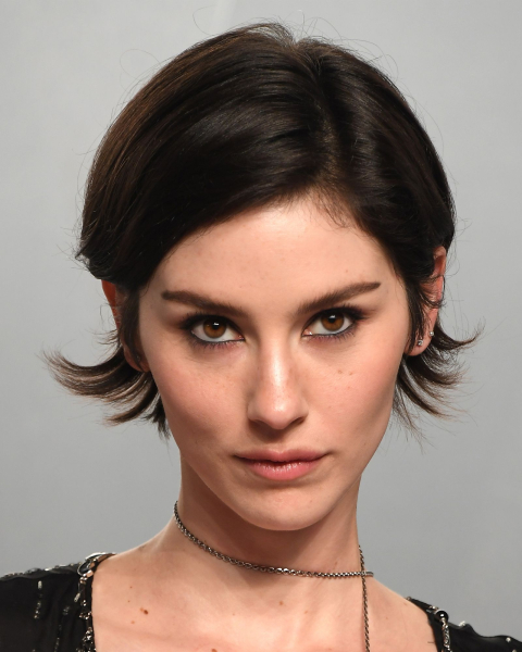 Closeup of a woman with waterline makeup.