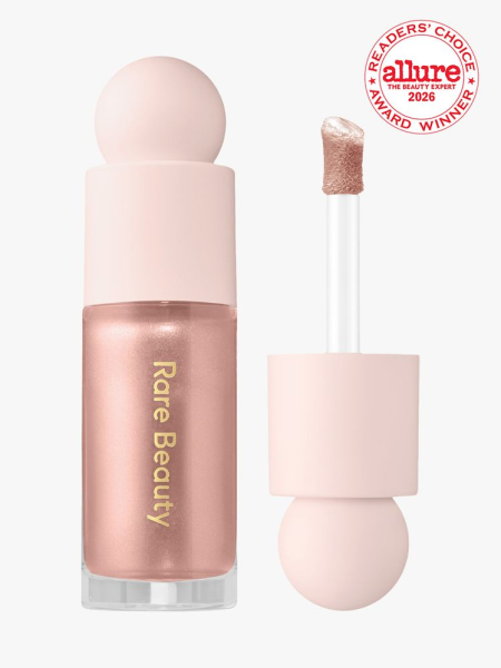 Container of Rare Beauty Liquid Luminizer on white background